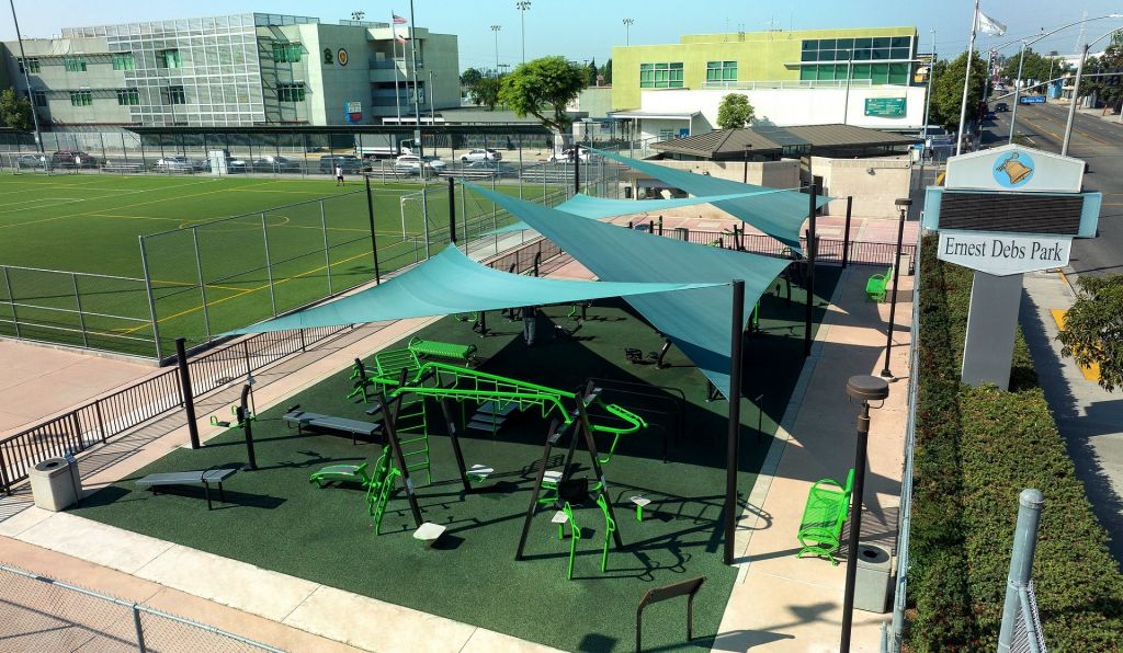 Fitness equipment at park with sports fields 183d17ce614a305ef7e14498bef98c4b